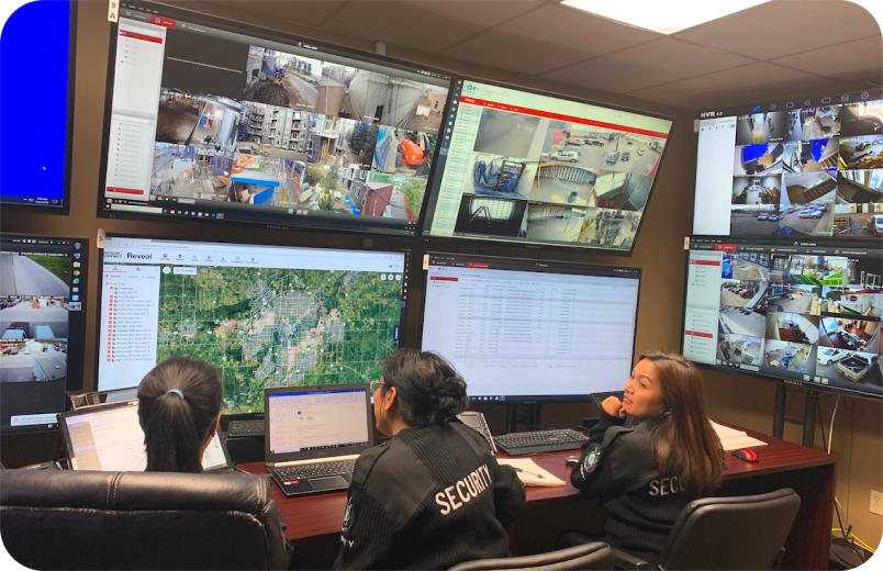 Security operators monitoring live camera feeds in the command centre